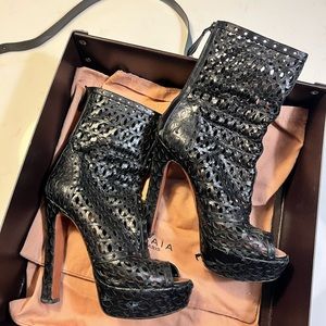 Alaia booties in black. 6” Heel. Well made.